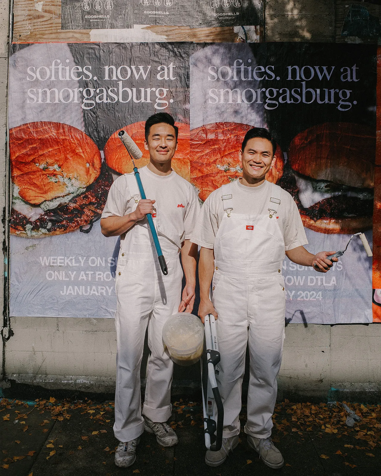 Josh Kim and Sam Hong in front of Softies poster at Smorgasburg LA.